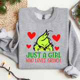 a grey shirt with a grin face on it