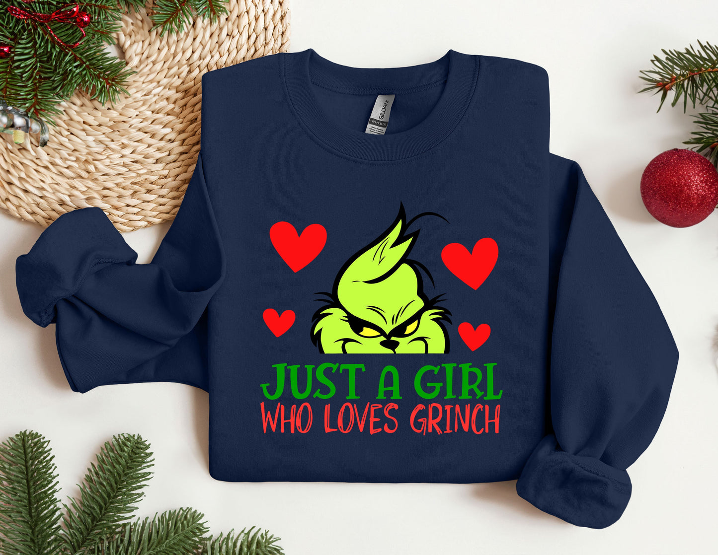 a t - shirt that says just a girl who loves grin