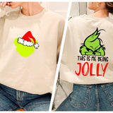 a woman wearing a sweatshirt with the grin face on it