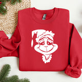 a red sweatshirt with a santa claus face on it