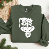 a green sweatshirt with a white image of a monkey wearing a santa hat
