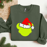 a green sweatshirt with a santa hat on it
