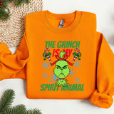 an orange sweatshirt with the grin is my spirit animal on it