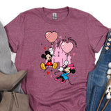 a t - shirt with a minnie mouse and mickey mouse on it