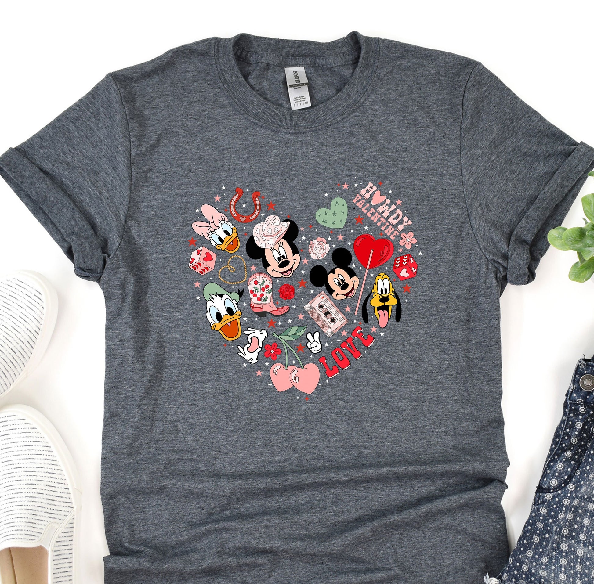 a t - shirt with a mickey mouse heart on it