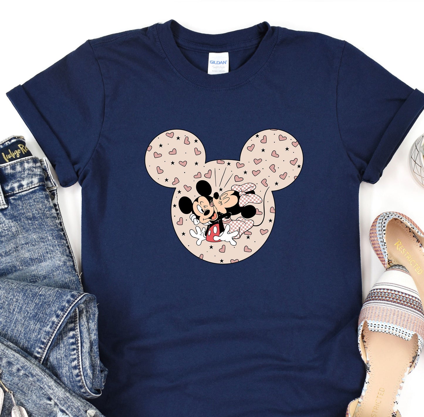 a t - shirt with a mickey mouse face on it