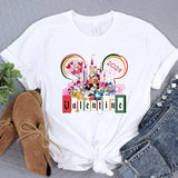 a white shirt with a mickey mouse graphic on it