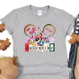 a mickey mouse t - shirt with the word disney on it