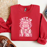 a red shirt with a pig on it next to a pair of shoes