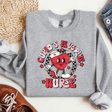 a grey sweatshirt with a heart on it