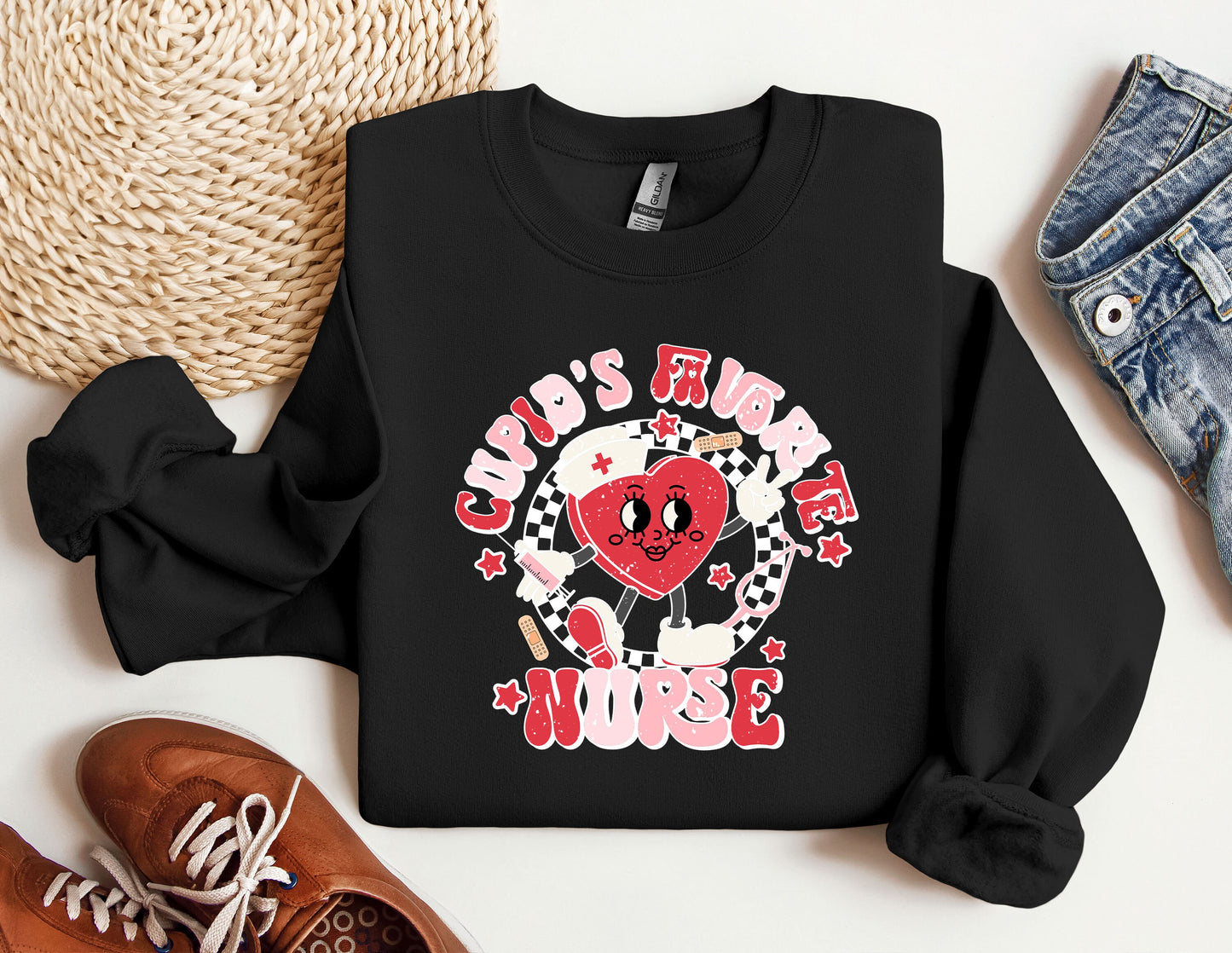 a black sweatshirt with a red heart on it