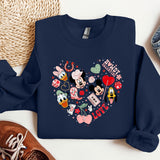 a mickey mouse heart shaped sweatshirt next to a pair of sneakers