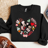 a black sweatshirt with mickey mouse and minnie mouse hearts