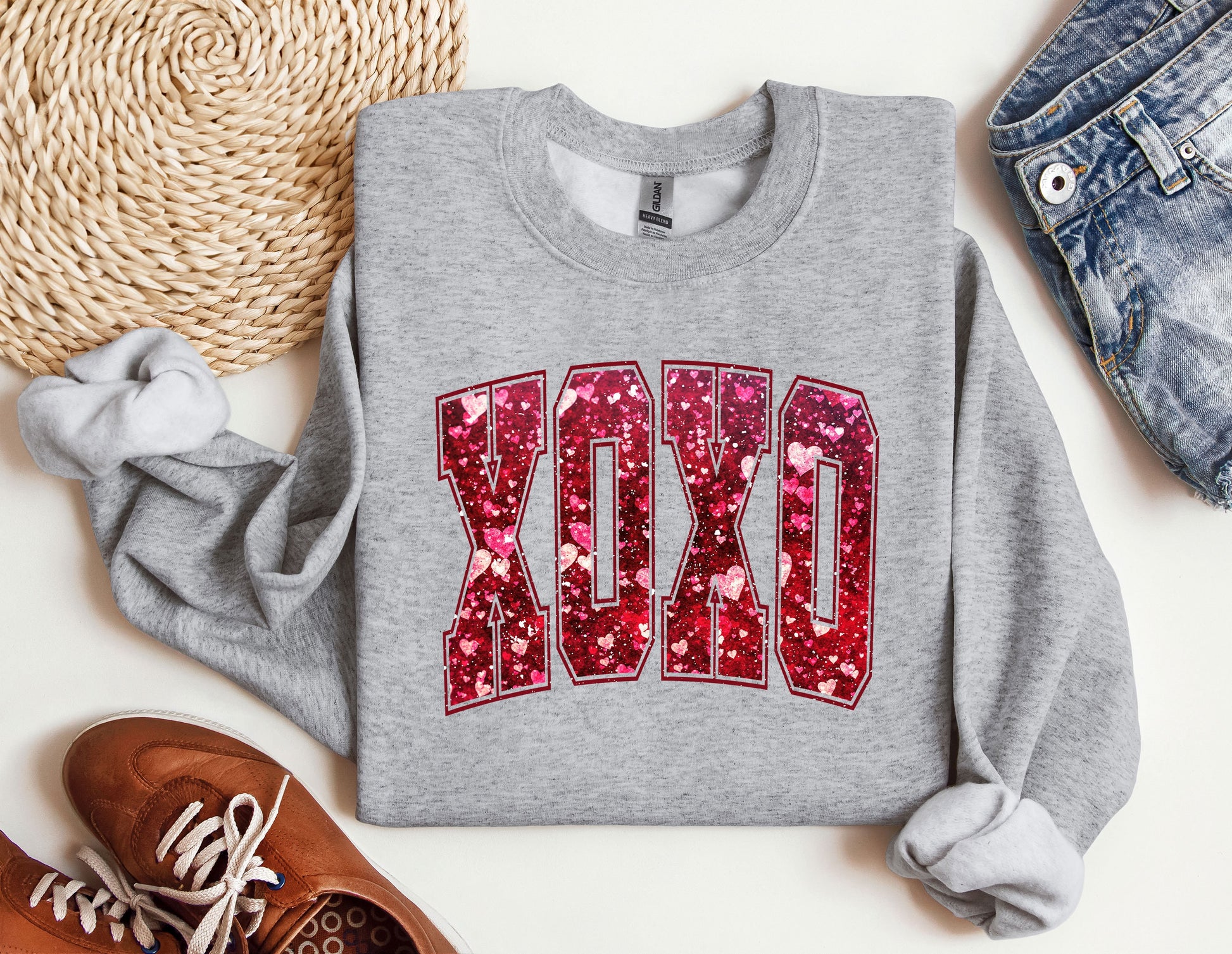 a pair of shoes and a sweatshirt with the word dad on it