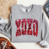 a pair of shoes and a sweatshirt with the word dad on it