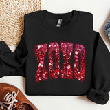 a pair of sneakers and a sweatshirt with the word dad printed on it