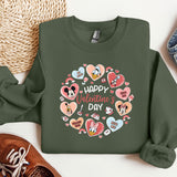 a green sweatshirt with hearts and the words happy valentine's day