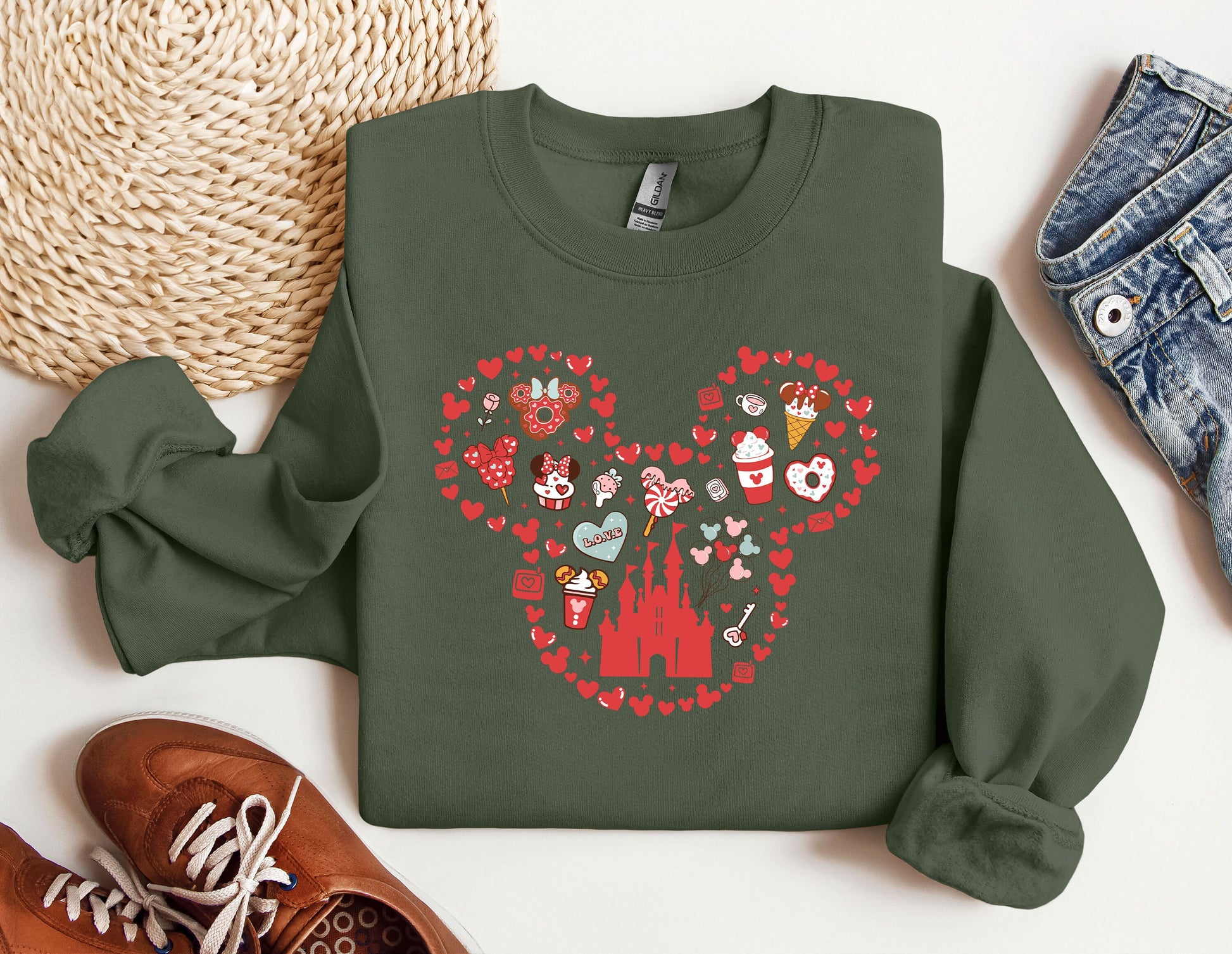 a sweater with a mickey mouse design on it