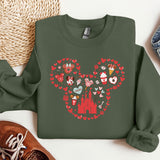 a sweater with a mickey mouse design on it