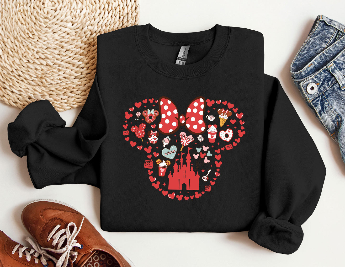 a black shirt with a minnie mouse design on it