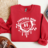 a red sweatshirt with a football mom on it