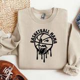 a sweatshirt with the words basketball mom on it