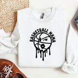 a white sweatshirt with a basketball design on it