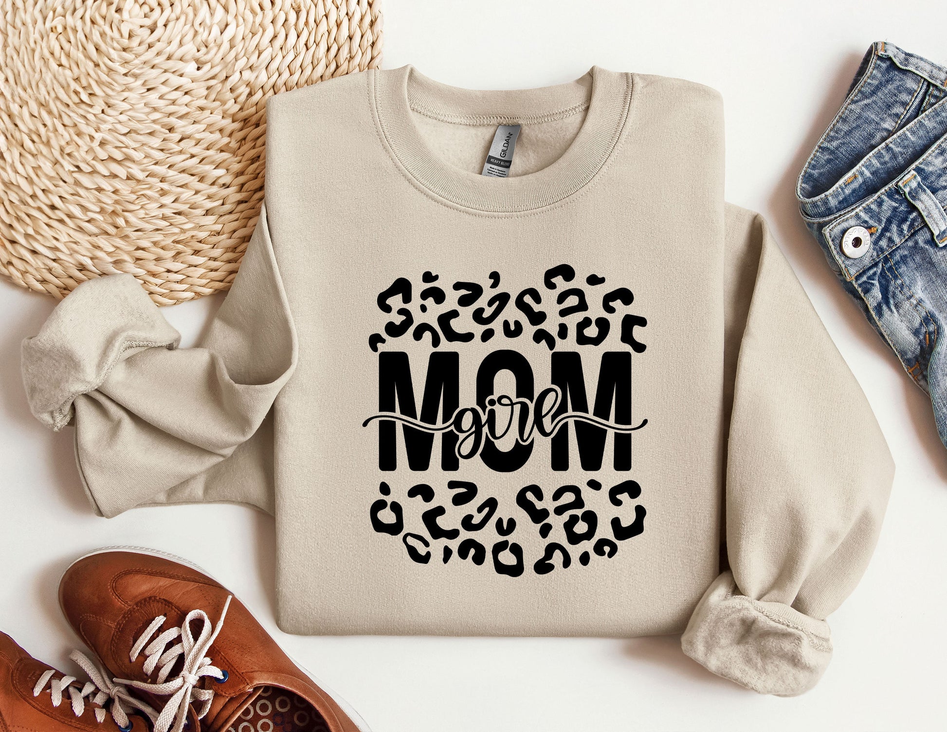 a sweater with the word mom printed on it