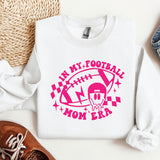 a white shirt with a pink graphic on it