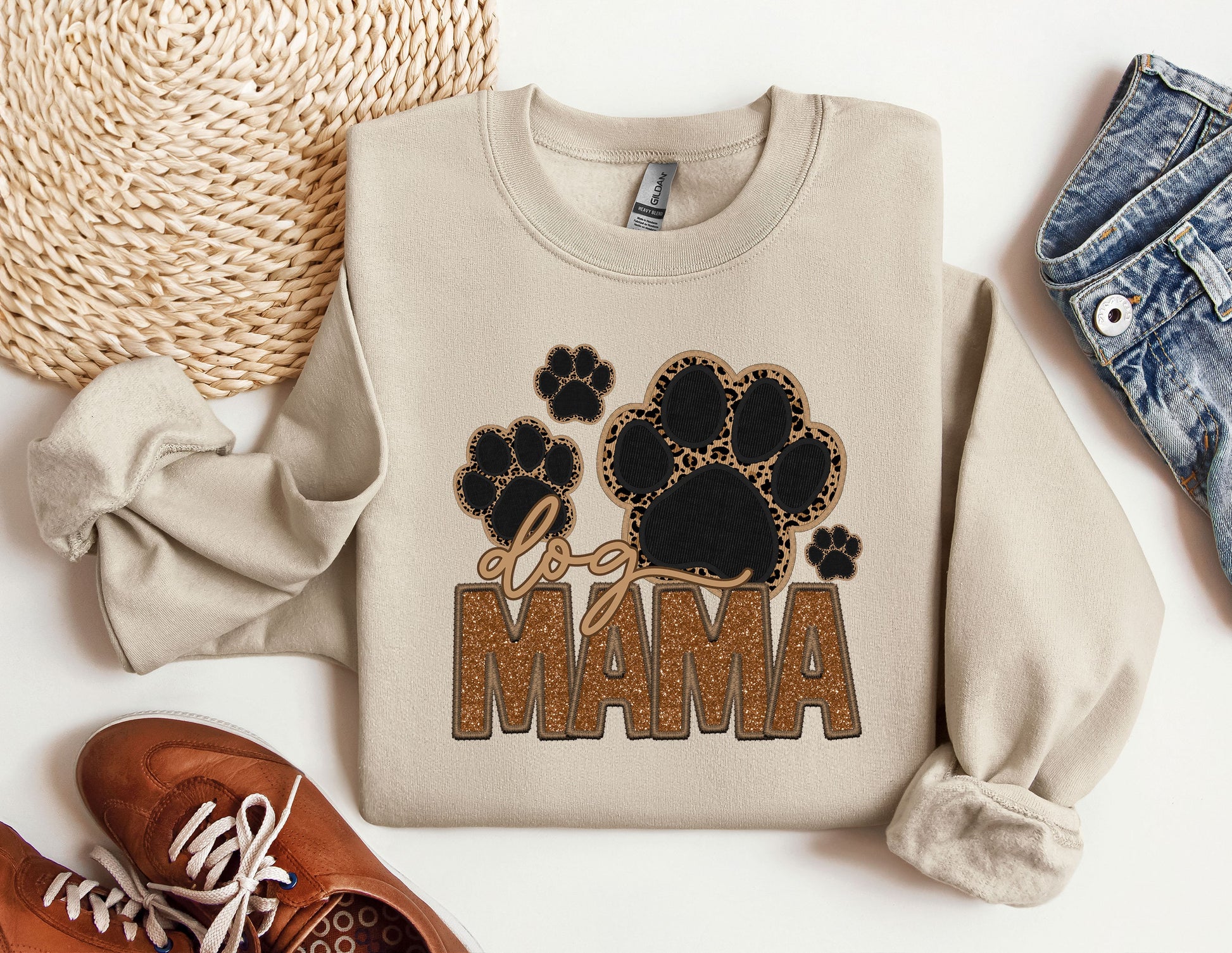 a pair of shoes and a sweatshirt with the word mama printed on it