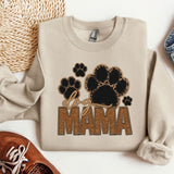 a pair of shoes and a sweatshirt with the word mama printed on it