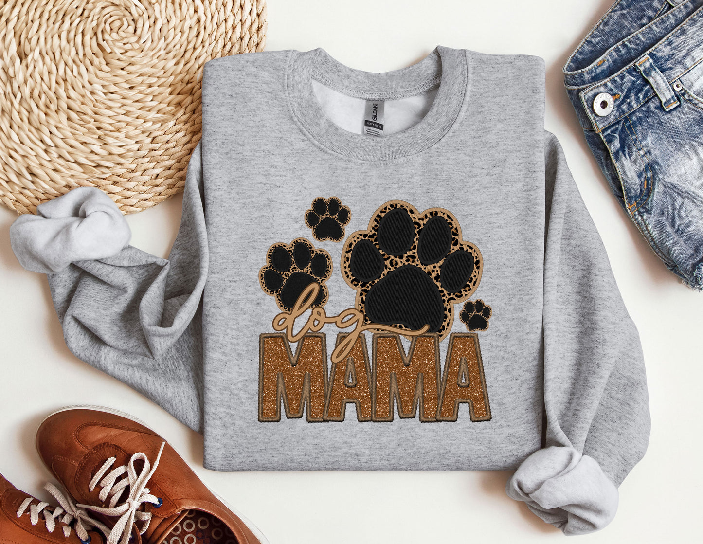 a gray sweatshirt with the word mama printed on it