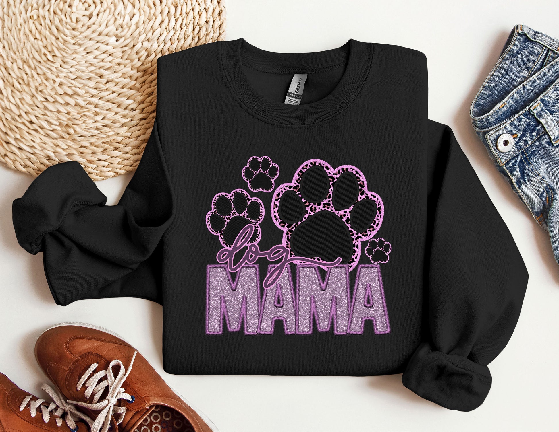 a black sweatshirt with the word mama printed on it