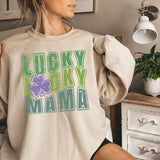 a woman wearing a sweatshirt that says lucky lucky mama