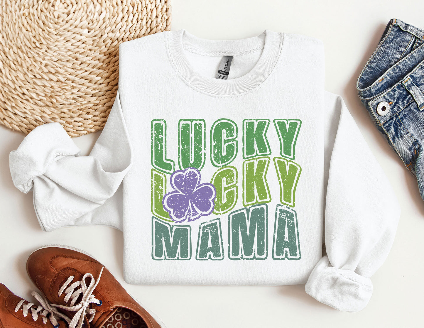 a lucky lucky mama sweatshirt next to a pair of shoes