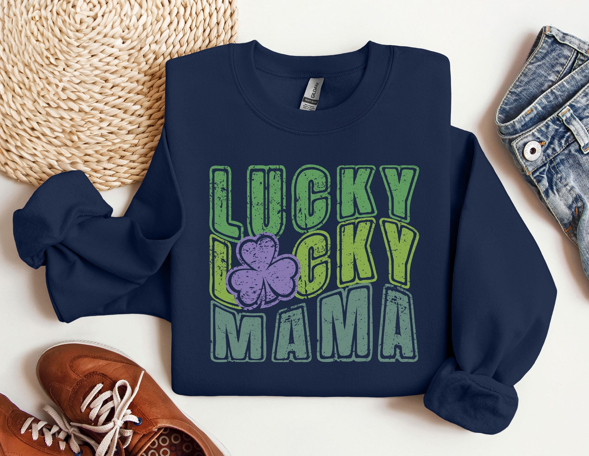 a lucky lucky mama sweatshirt next to a pair of sneakers