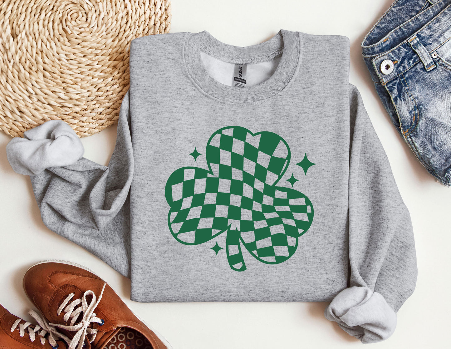 a st patrick&#39;s day sweatshirt with a shamrock on it
