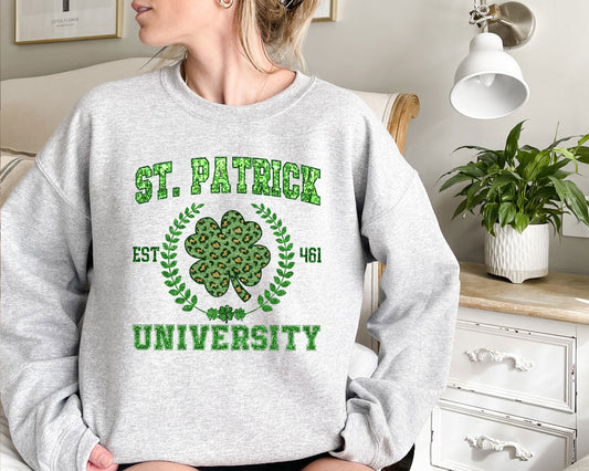 a woman wearing a st patrick&#39;s university sweatshirt