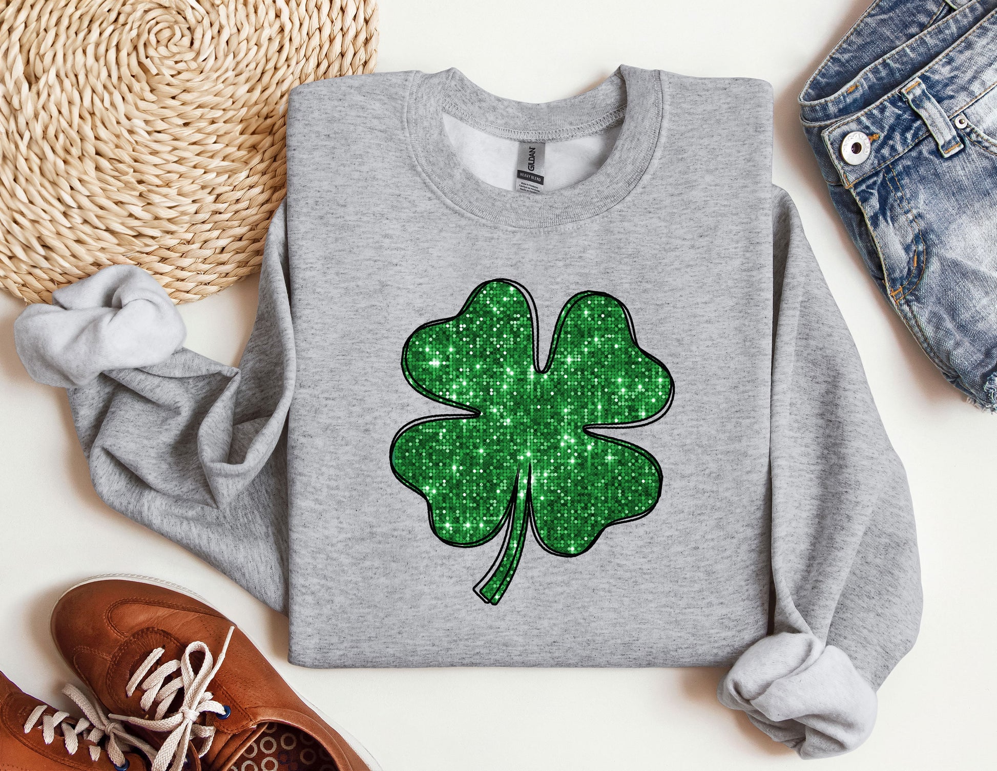 a st patrick&#39;s day sweatshirt with a shamrock on it