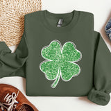 a green sweatshirt with a shamrock on it