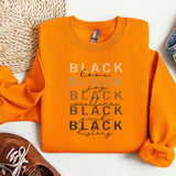 a pair of shoes and an orange shirt on a white surface