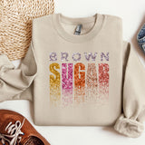 a sweater with the word iron sew on it next to a pair of shoes