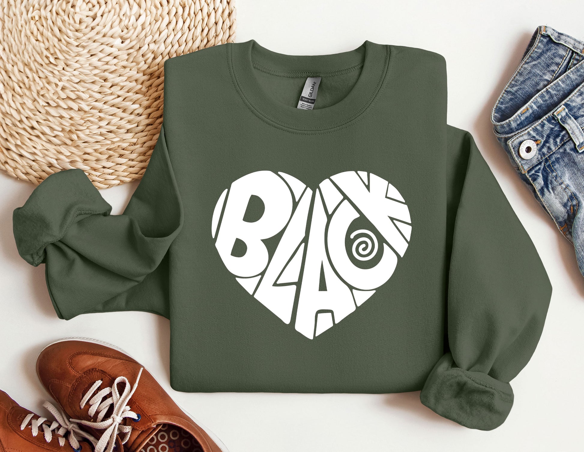 a green sweatshirt with the word baao printed on it