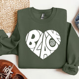 a green sweatshirt with the word baao printed on it