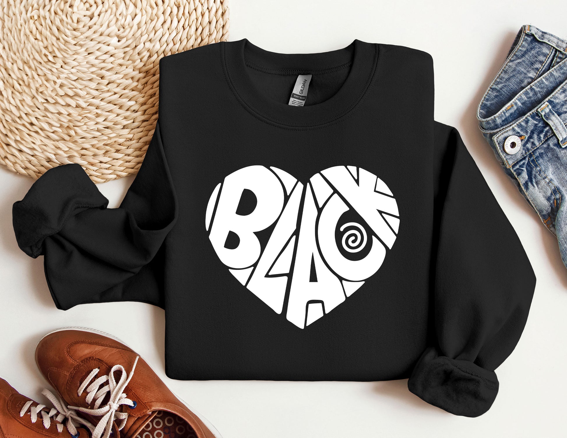 a black sweatshirt with the word baq on it