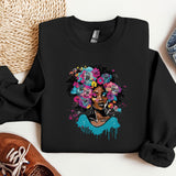 a black woman with flowers on her head wearing a sweatshirt