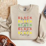 a sweater that says black is the new black