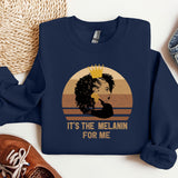a blue sweatshirt with a picture of a woman wearing a crown