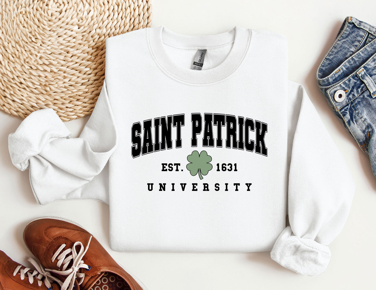 a white sweatshirt with saint patrick&#39;s university on it