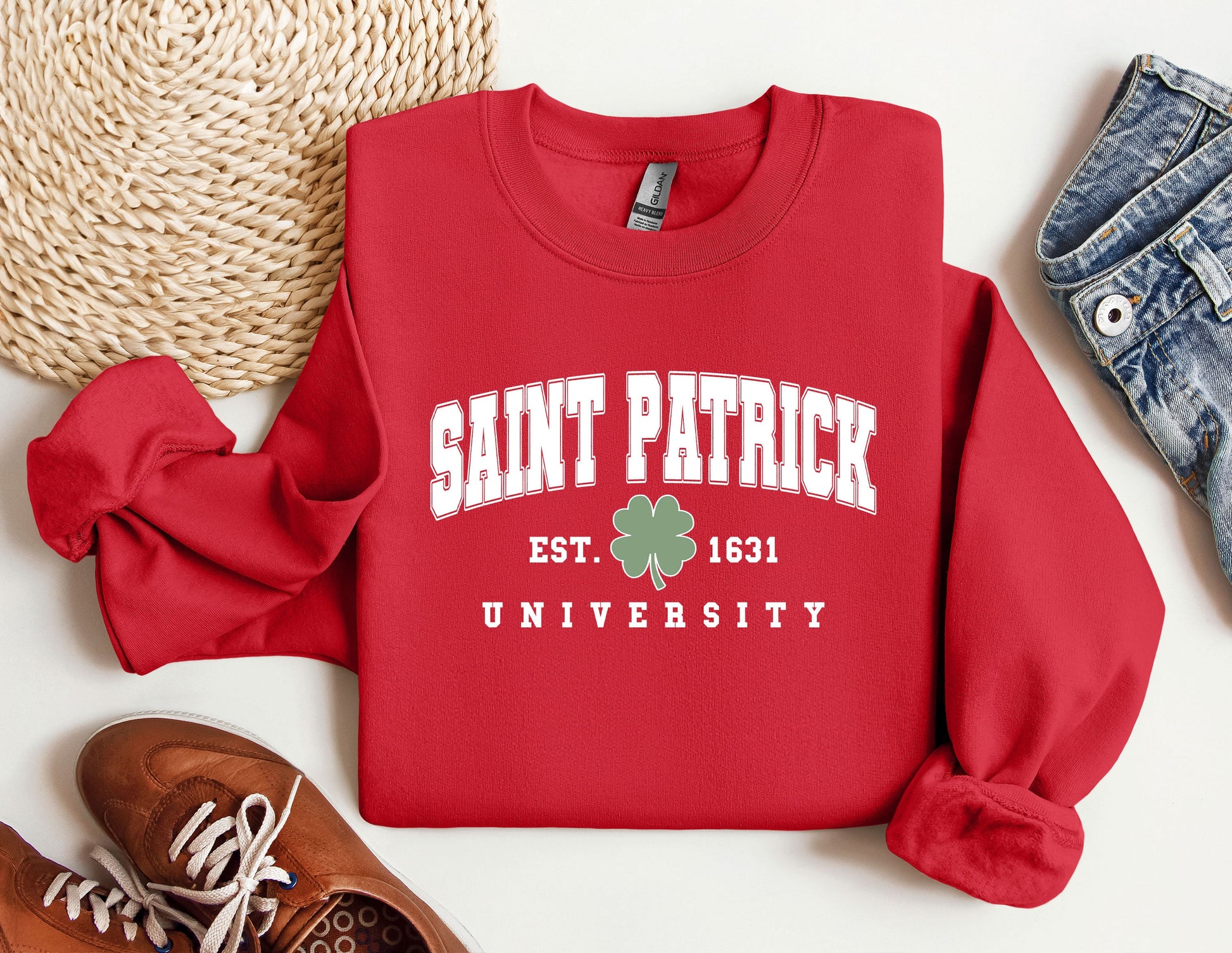 a red sweatshirt with saint patrick&#39;s university on it